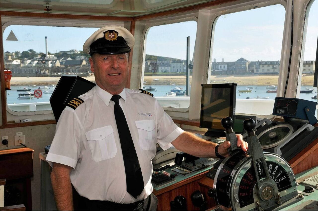 David Pascoe stood on board Scillonian III in the bridge at St Mary's