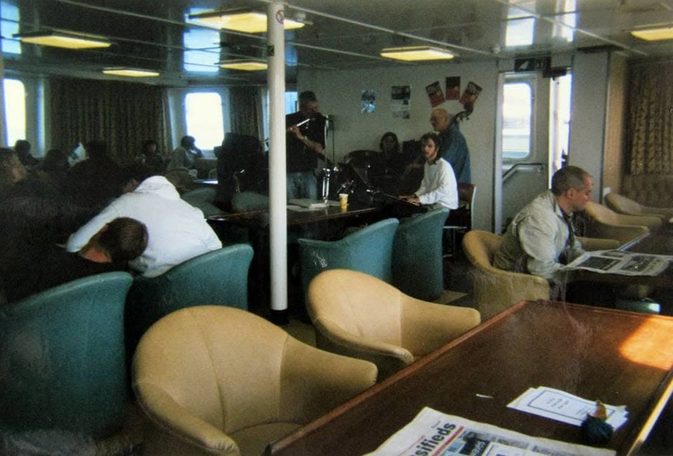 Scillonian III café, slightly older photo, with a few people using the café